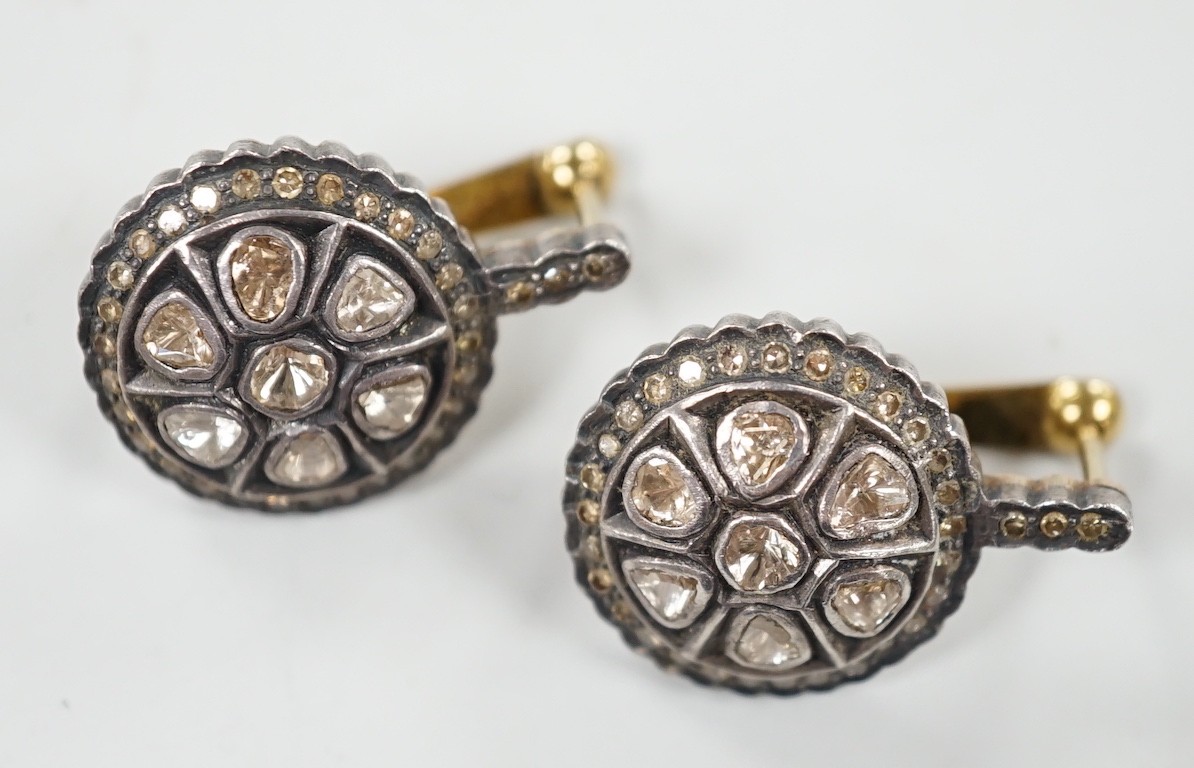 A pair of Indian, yellow and white metal, rose and rout cut diamond set target cluster earrings, diameter 18mm, gross weight 11.8 grams.